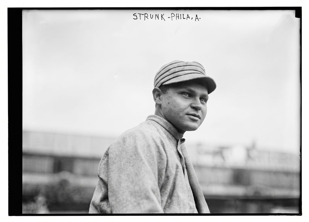 Enhanced 1910s glass-plate photo of a baseball player